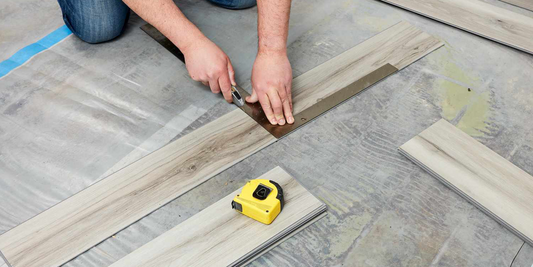 Rigid Core Vinyl Plank Flooring Being Installed